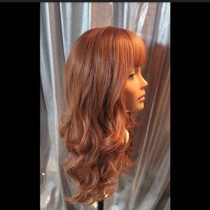 Auburn human-synthetic blend. Washed and customized ready to wear!